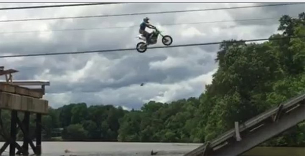 Cops Hunt Dirt Bikers Who Jumped Collapsed Bridge In Evel Knievel-Style Stunt