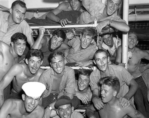 Photo Number: 80-G-343608 - Surrender of Japan, 1945 / Crew members on USS Wileman (DE-22) celebrate upon hearing of Japan's acceptance of surrender terms, August 15, 1945. (Official U.S. Navy Photograph, National Archives)