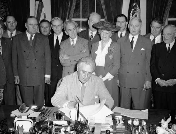 Franklin D. Roosevelt signs GI bill on June 22, 1944