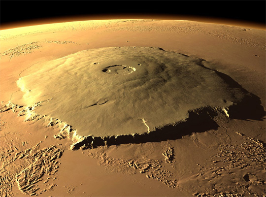Why are the mountains and volcanoes on Mars so much taller than those on Earth?