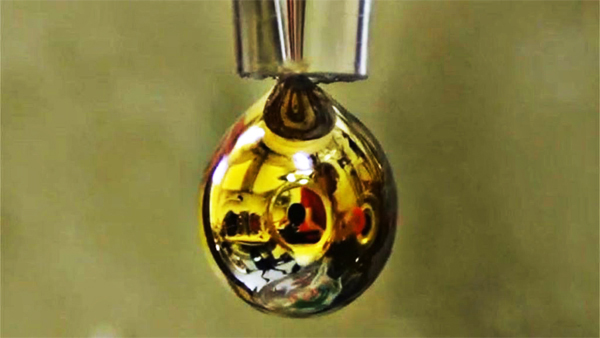 Scientists transform water into shiny, golden metal