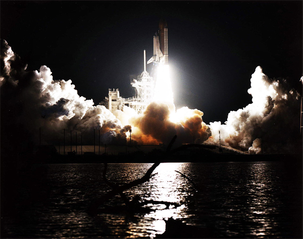 Space Shuttle Discovery is launched on a mission to service the Hubble Space Telescope on February 11, 1997
