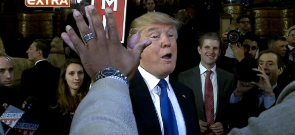 Donald Trump took his hands campaign directly to the media - matching palms with a reporter in an attempt to prove he measures up